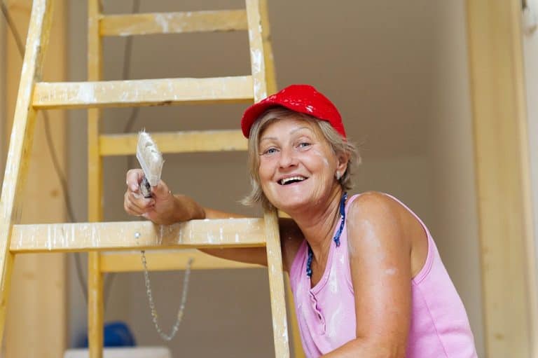 Senior woman painting